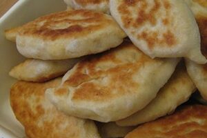 Жареные пирожки с яйцами Жареные пирожки с яйцами