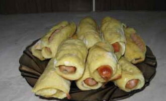Сосиски в картофеле