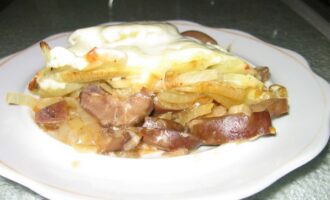 Почки говяжьи, запеченные с луком