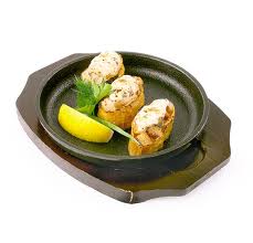 Морской гребешок, запеченный под сыром