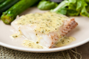 рецепт Филе трески в духовке с чесноком и лимоном