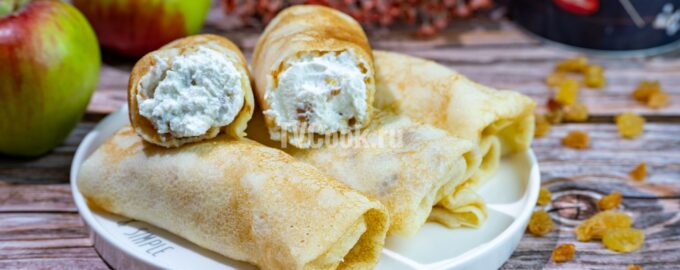 рецепт Блинчики с творогом и изюмом